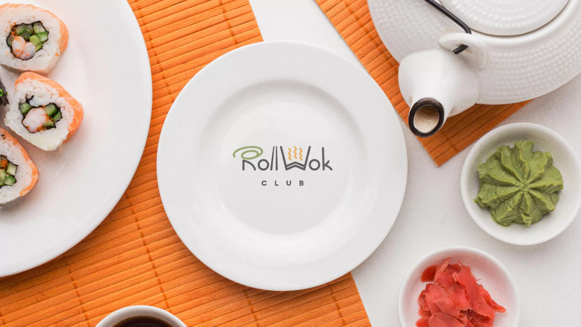 Разработка логотипа и фирменного стиля в Южноуральске для суши-бара «Roll Wok Club» Разработка логотипа и фирменного стиля в Южноуральске для суши-бара «Roll Wok Club»